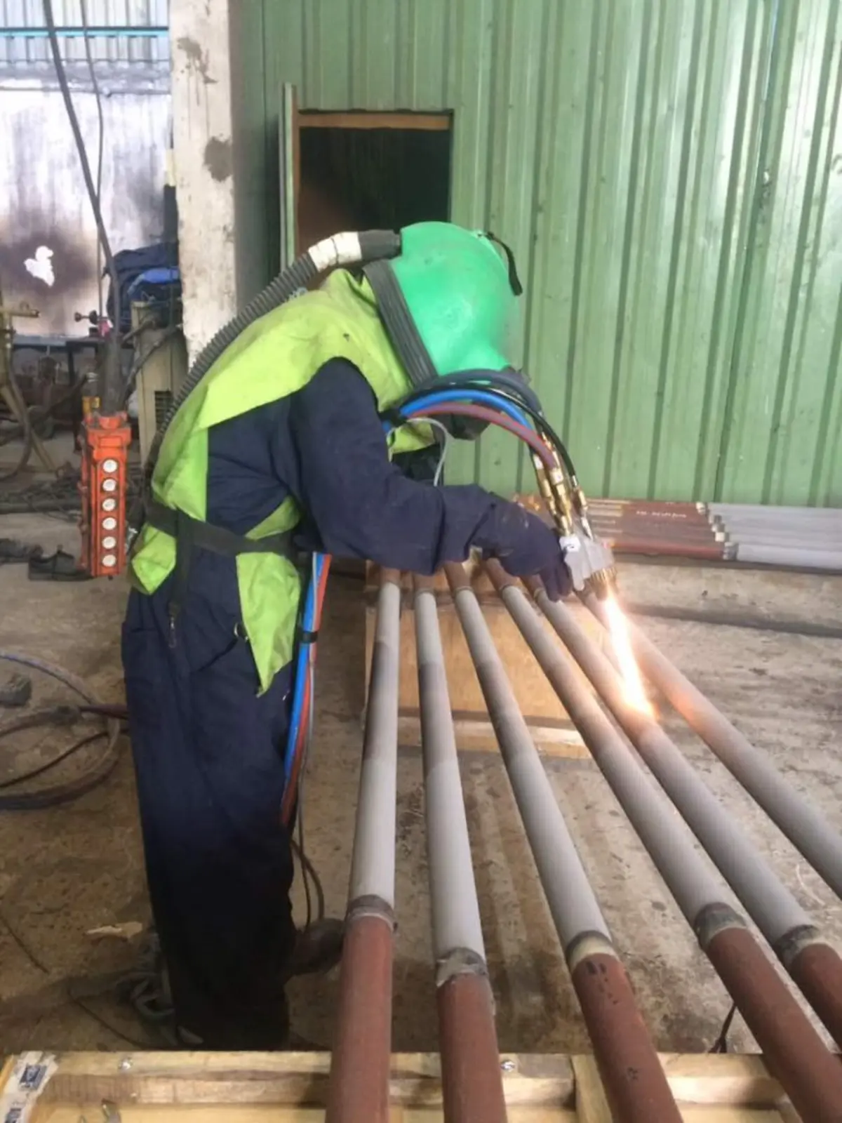 Twin wire arc spray coating applied to boiler tube bundle