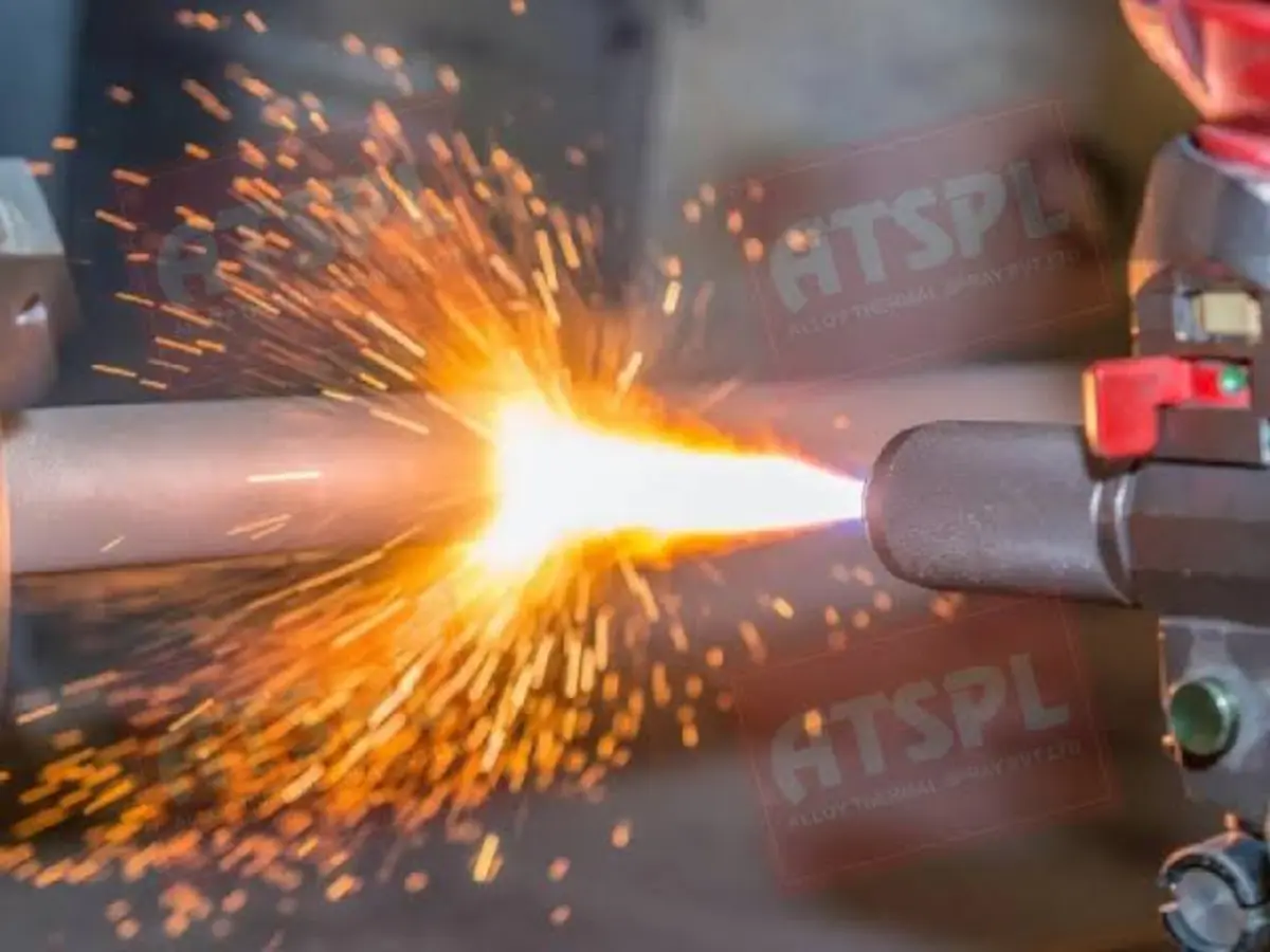 Close-up of wire spray coating in progress