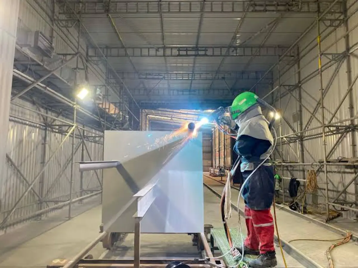 Twin wire arc spray coating on a structural steel panel