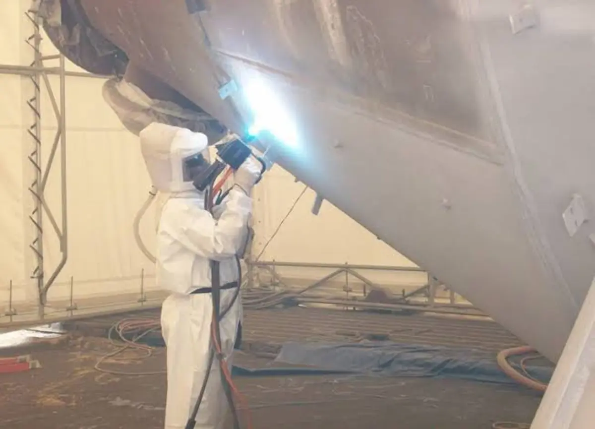 Twin wire arc spray coating applied to a storage tank/hopper